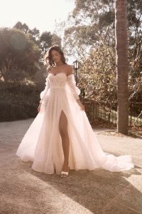 bride wearing new bridal gown from Anna Campbell bridal collection Bloom 2024