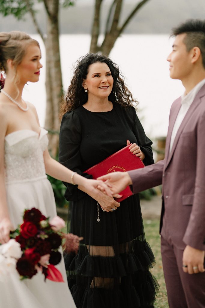 Bride and groom saying vows with wedding celebrant at Montville wedding