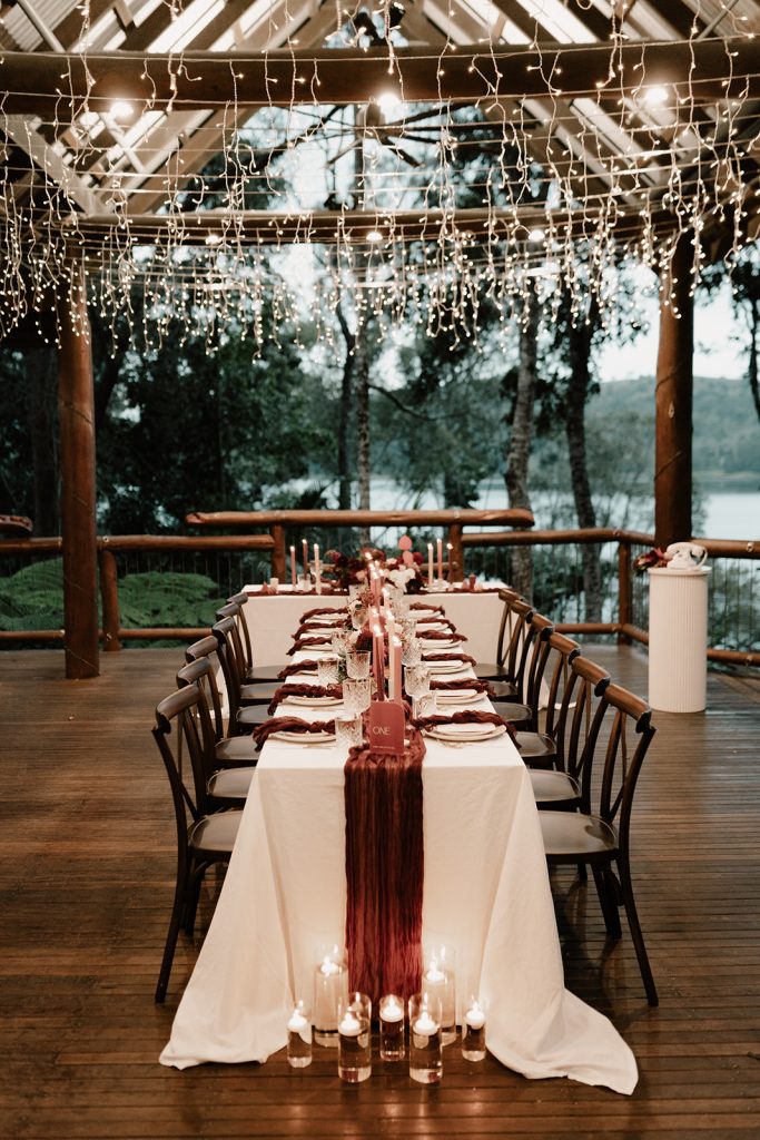 Sunshine coast Hinterland edding reception venue table on the deck at Secrets on the Lake Sunshine Coast hinterland wedding venue